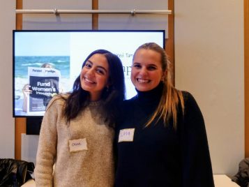 Chloe Cardello and Lola Nordlinger standing in front of their project, "The Reimagined Tampon: Revampon."